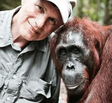 Encouraging donations to support orangutan conservation and environmental protection initiatives in Indonesia"